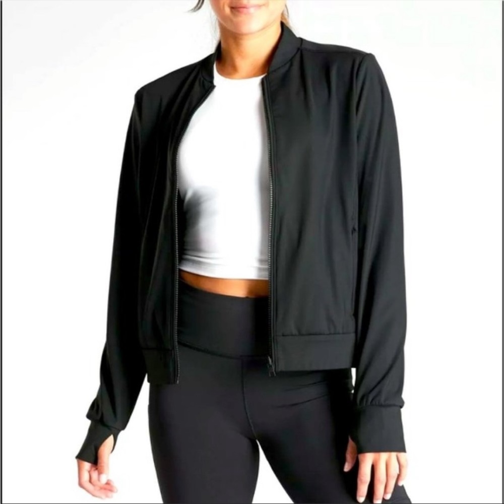 Zella Black Reversible Bomber Jacket. One side is multicolored. 2 front pockets